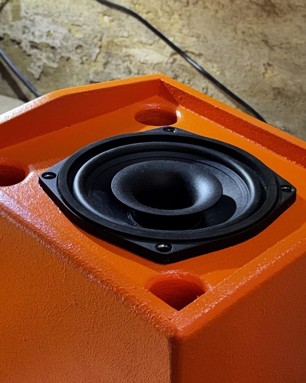 A custom faceted booth monitor at The Darkroom